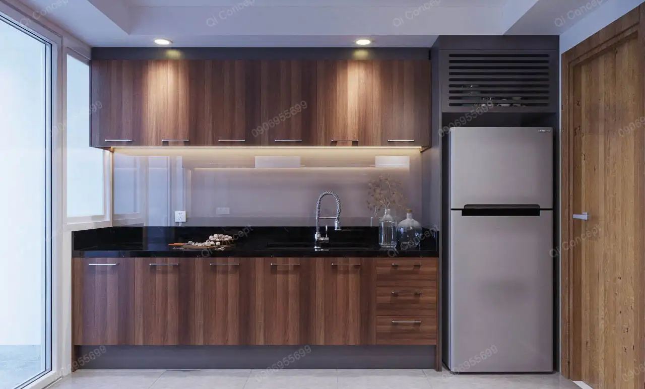 Tủ bếp gỗ công nghiệp hiện đại tích hợp tủ lạnh âm tường trong thiết kế nội thất Saigon Pearl.