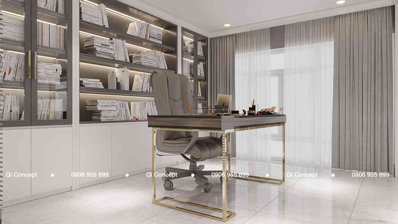 Phòng làm việc tại gia với hệ tủ kính trưng bày sách trong thiết kế căn hộ Phú Hoàng Anh.
