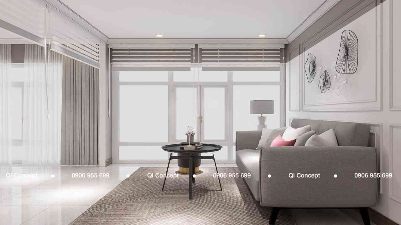 Góc sofa nhỏ gọn bên cửa sổ lấy sáng tự nhiên của dự án thiết kế căn hộ Phú Hoàng Anh.