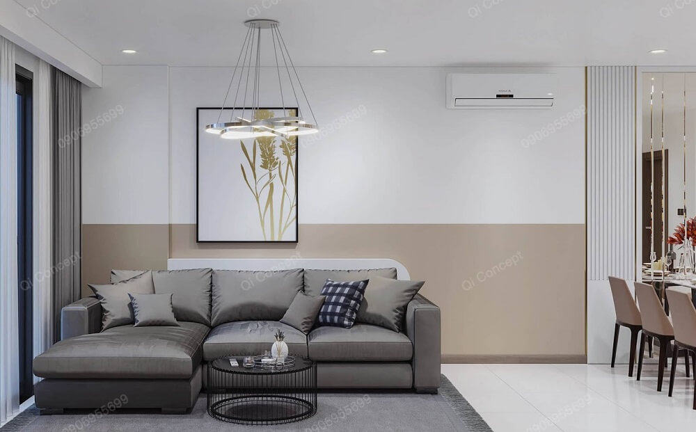 Bố trí sofa chữ L lớn với tone màu xám chuột hiện đại giúp không gian thêm phần ấn tượng