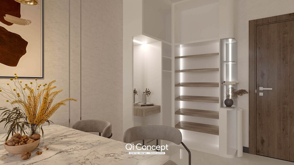 Hệ thống tủ âm tường sau khu vực ăn giúp tăng thêm không gian để vật dụng