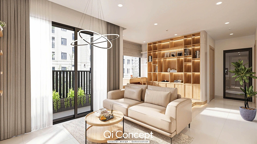 Hoàn thiện thi công nội thất chung cư với phòng khách có kệ sách lớn bằng gỗ.