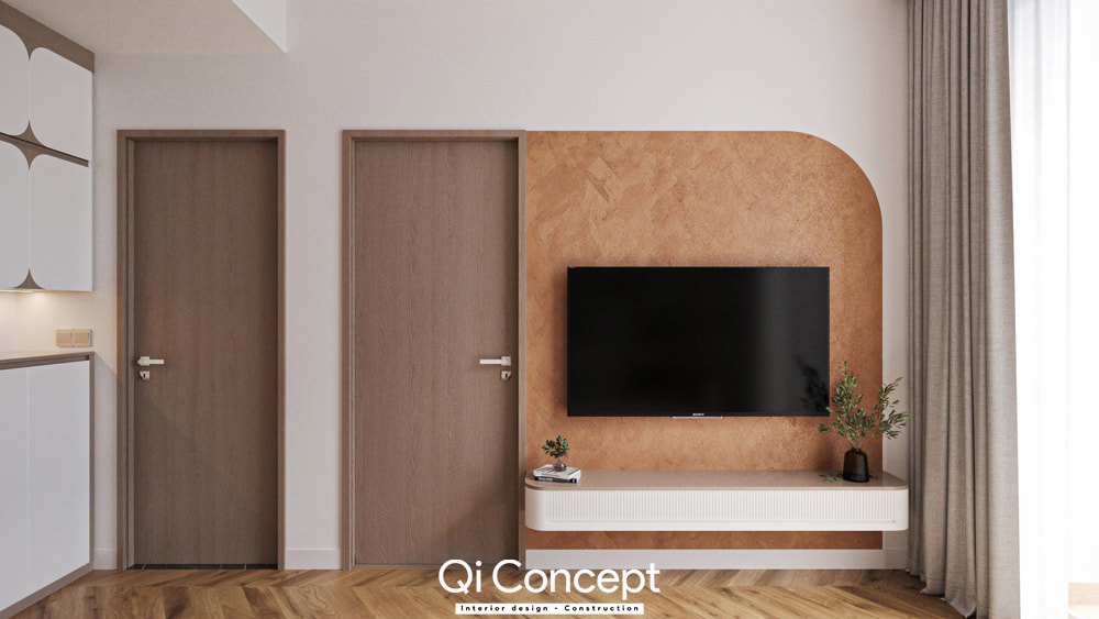 Mảng tường TV được ốp vật liệu hiệu ứng bo cong độc đáo trong thiết kế nội thất chung cư 60m2.