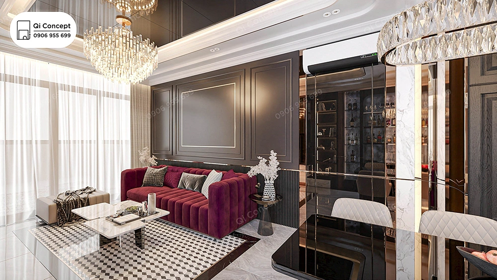 Thiết kế nội thất nhà phố phong cách luxury với sofa nhung đỏ và đèn chùm pha lê lộng lẫy.