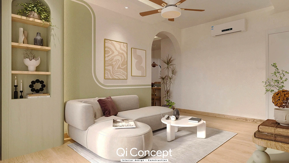 Phòng khách trong thiết kế nội thất nhà phố với mảng tường màu xanh lá cây và sofa cong.