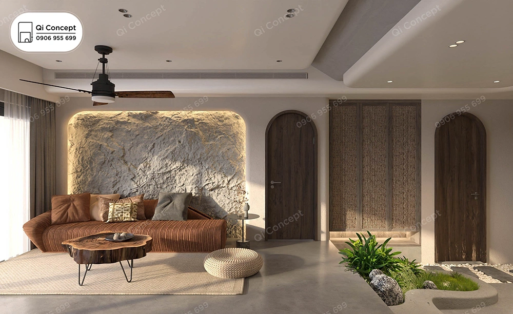 Thiết kế nội thất nhà phố độc đáo với vách tường ốp đá thô và tiểu cảnh sân vườn.