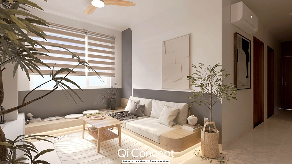 Thiết kế nội thất nhà 2 tầng với phòng khách tối giản và sofa bệt.