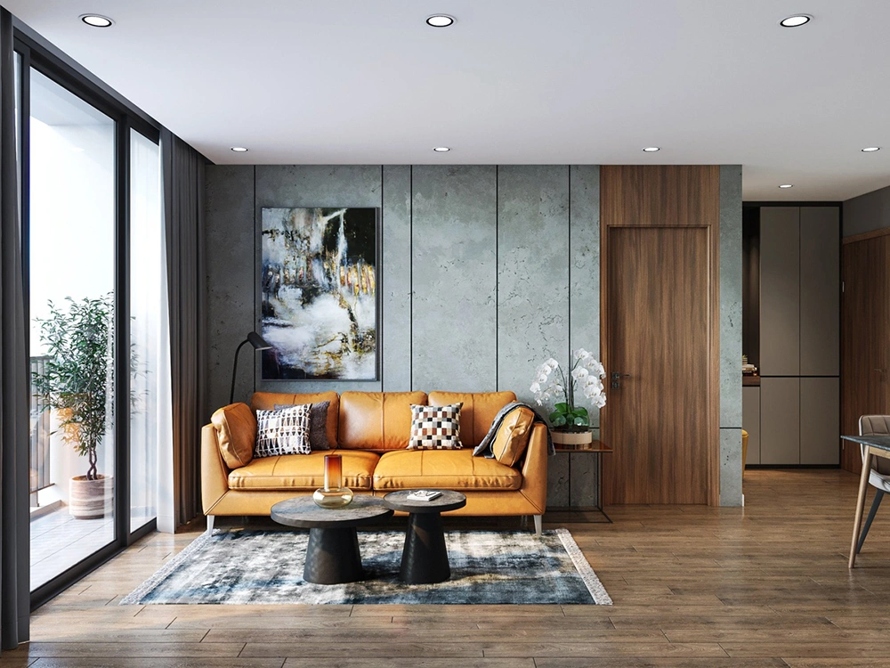 Mẫu thiết kế phòng khách chung cư hiện đại với sofa da và tường hiệu ứng bê tông.