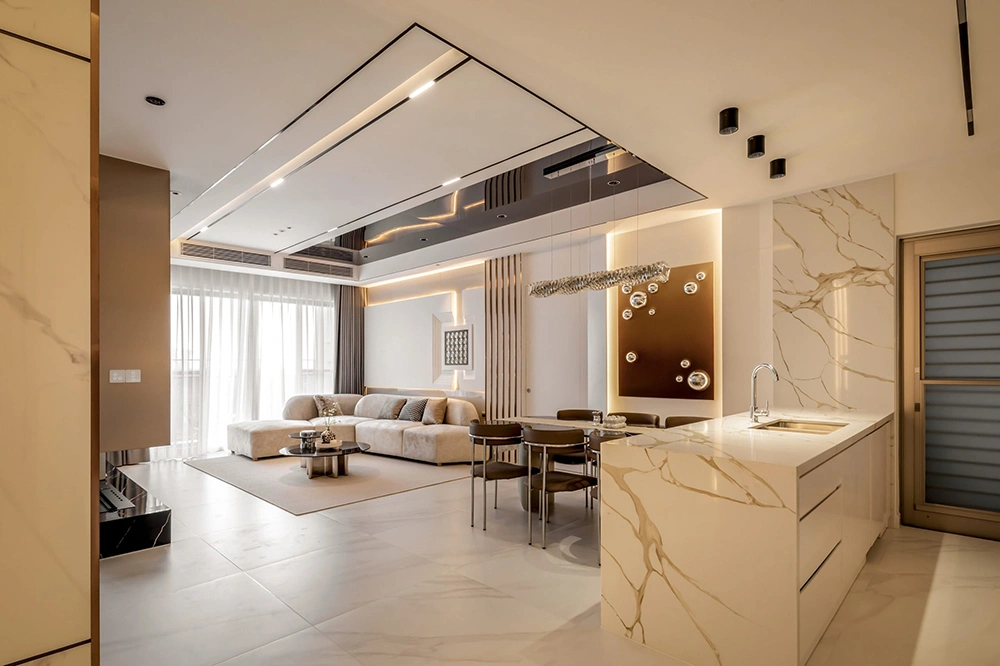 Một mẫu thiết kế phòng khách chung cư hiện đại với đảo bếp ốp đá marble.