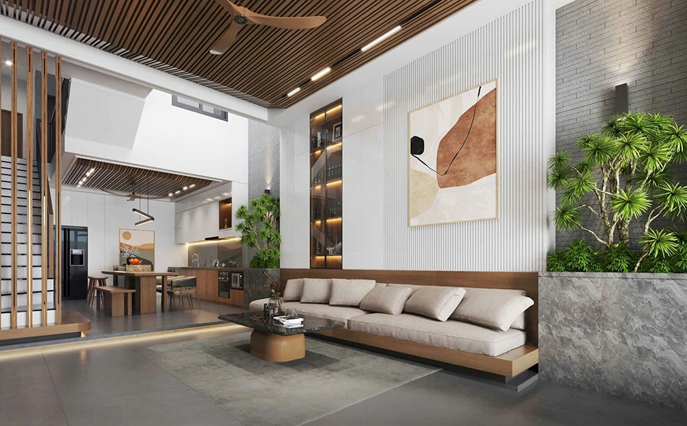 Thiết kế phòng khách liền bếp nhà ống với trần nan gỗ, sofa tích hợp và cây xanh.