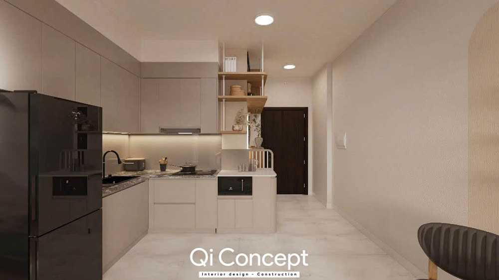 Thiết kế khu vực bếp chữ L hiện đại trong căn hộ chung cư Tara Residence 1PN, sử dụng tủ bếp màu xám ghi.