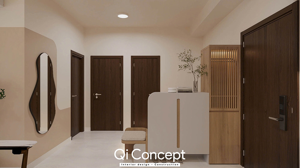Khu vực sảnh vào trong thiết kế nội thất căn hộ The Aurora 1PN với tủ giày gỗ kết hợp màu trắng và gương soi độc đáo.