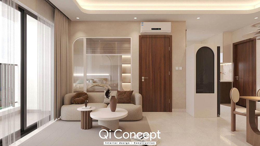 Phòng khách với vách kính hiện đại nhìn vào phòng ngủ trong mẫu thiết kế nội thất căn hộ The Aurora 2PN.