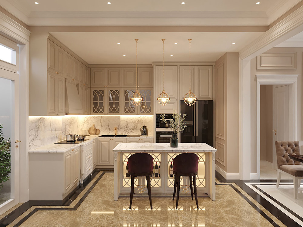 Thiết kế phòng bếp biệt thự phong cách tân cổ điển với tủ bếp màu kem và đảo bếp mini.