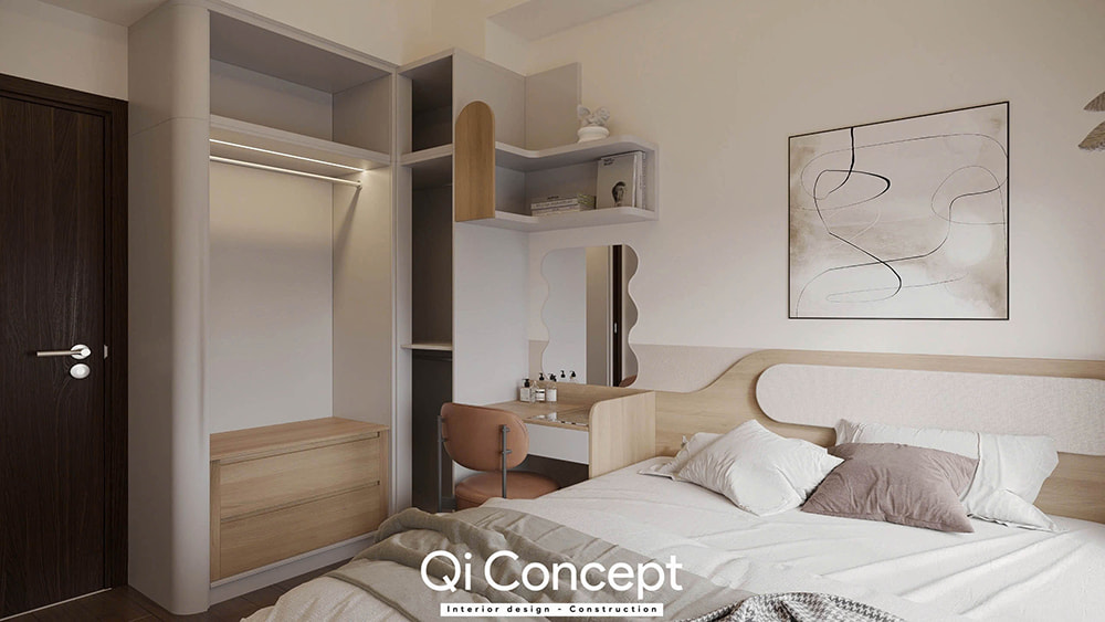 Thiết kế nội thất phòng ngủ nhỏ với các chi tiết bo cong và bàn trang điểm liền kề.