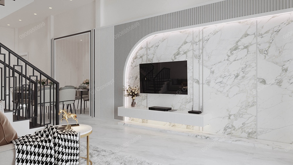 Vách tivi ốp đá marble bo cong độc đáo trong dự án nội thất nhà phố hiện đại.