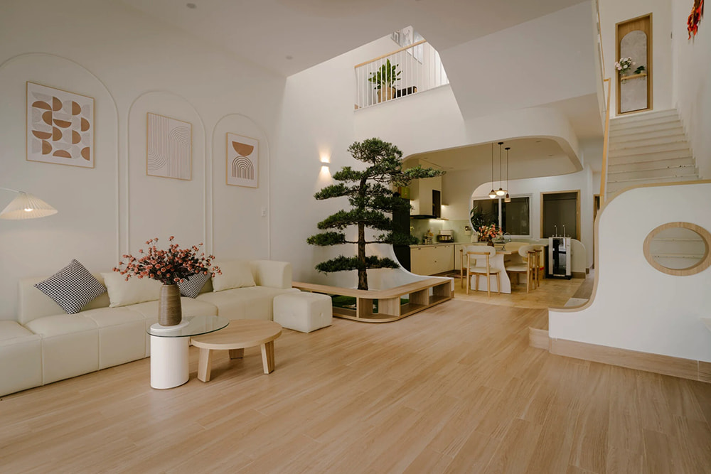 Tổng thể không gian phòng khách liền bếp thông thoáng của nhà phố thiết kế nội thất Bình Dương.