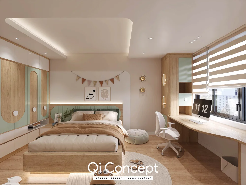 Phòng ngủ phụ với đầu giường xanh nhạt, tủ áo và bàn cạnh cửa sổ