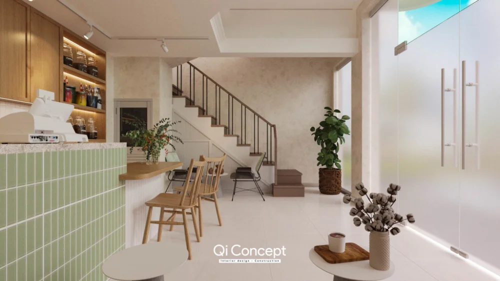 Góc nhìn từ quầy cà phê về cửa ra vào và cầu thang